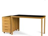 an image of a wooden desk with a black top and drawers