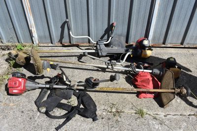 a lot of tools that are laying out on the ground