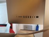 a close up of a computer monitor with a cord attached to it