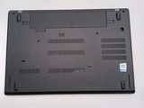 a black laptop with a blue sticker on the back of it