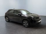 the black suv is parked in a room with a gray floor