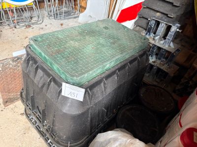 an image of a trash can sitting in the middle of a pile of trash