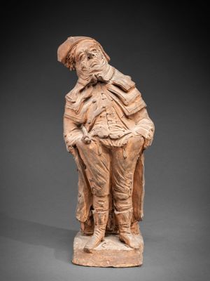 an image of a statue of a man with a hat and jacket