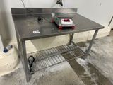 an image of a table with a scale on top of it