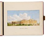 an open book with a picture of a large building in the background