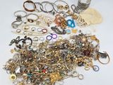 many different types of jewelry on the table