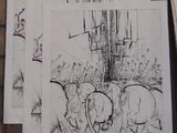 several drawings of elephants are shown on a table next to a piece of paper