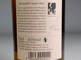 a label on a bottle of wine on a table