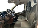 a view of the inside of a vehicle from the driver ' s seat