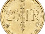 a close up of a coin with a flower on it