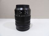 a close up of a camera lens sitting on a table