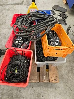 many different types of electrical equipment on the pallets
