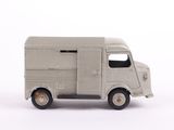 a toy truck that is sitting on a white surface
