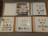many different types of stamps on the pages of a book