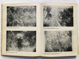 a book with pictures of people in the woods