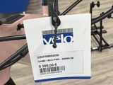 a close up of a bicycle with a name tag attached to it