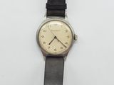 an image of a wrist watch on a white surface