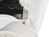 a close up of a wrist watch with a white wristband