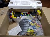 a box with a bunch of toys inside of it