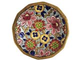 an image of a decorative plate with colorful flowers on it