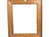 a wooden picture frame on a white background
