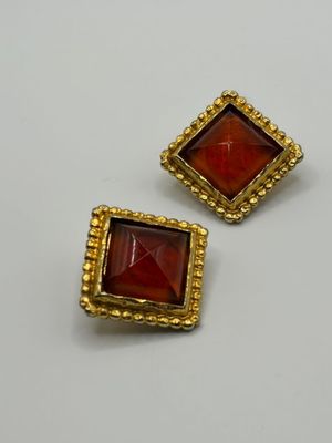 a pair of gold and carneline earrings