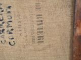a bag of coffee sitting on top of a wooden table