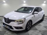 a white car parked in a room with a checkered floor