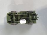a toy army vehicle with a tag on it