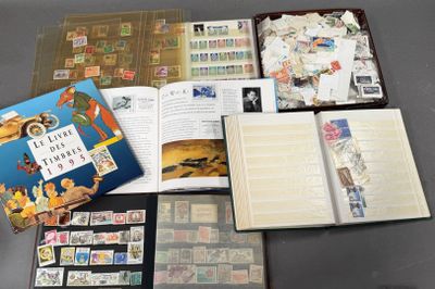 a lot of stamps and a book on the table