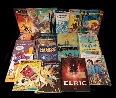 beaucoup de bandes dessinées posées sur une table noire