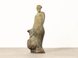 statue of a woman holding a baby in her arms