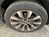 the tire of a car is shown with a flat tire
