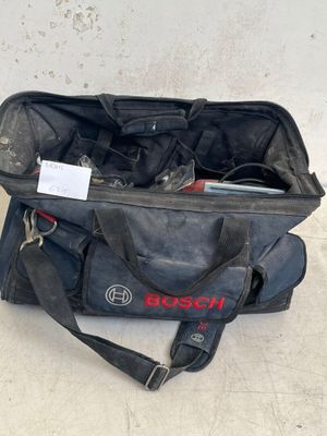 a black bag with tools in it on the floor