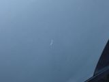 a close up of a car ' s front bumper with a dent on it