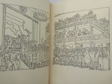 an open book with a drawing of a crowd of people in a building