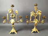 pair of antique brass candelabs with flowers and leaves