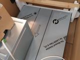 a box that has a computer in it and wires attached to it
