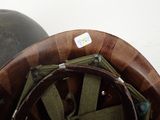 a close up of a helmet and a helmet on a table