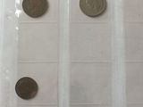 five different types of coins in a clear box