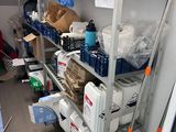 a room with a lot of boxes and boxes on the shelves