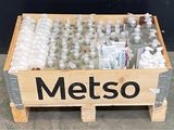 a wooden crate filled with bottles of water on a sidewalk