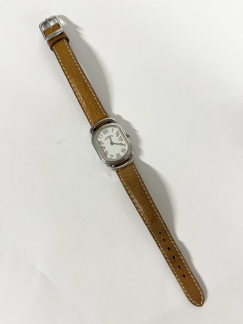 HERMÈS PARIS : MONTRE DE DAME en acier, modèle « Rallye », b…
