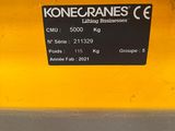a label on the back of a yellow truck