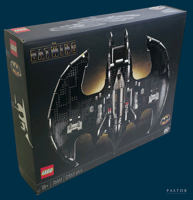 lego batman batmobile set in a box on a blue background