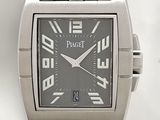 a silver watch with a black face on a white background