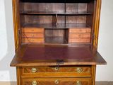 an old wooden desk with drawers and drawers on top of it