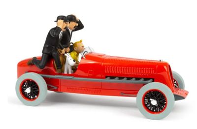 a toy car with a man and a dog in it