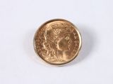 an image of a coin on a white surface