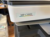 a printer that is sitting on top of a printer